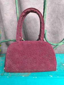 Maroon Shimmery Mini Handbag.