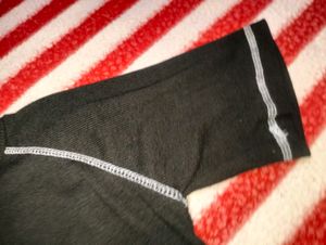 Black Top With White Coloured Work.