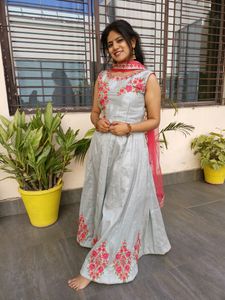 A beautiful grey lehenga with pink detailing