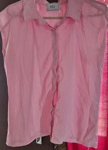 A Baby Pink Coloured Transparent Shirt.
