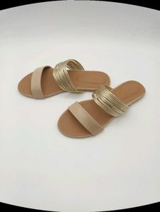 Tan And Gold Flat Sandals.
