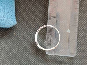 Pure silver ring in white zircon.