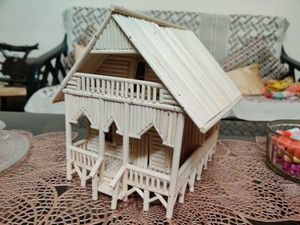 A beautiful and delicate hand-made art piece, perfect for decoration. This piece is exclusively made up of broomsticks signifying use of waste material.