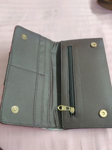An Ikkat Ladies Wallet  With Multiple Pockets
