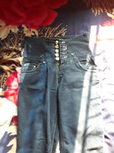 Its A High Waist Jeans With 5 Buttons
