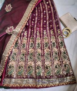 Maroon &amp; Green Embroidered saree