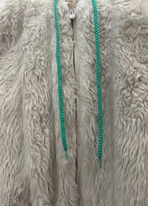 white fur jacket