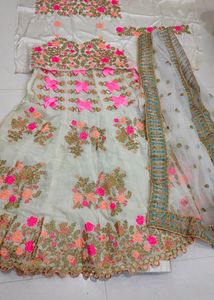 Heavy Embroidery Cream Colour Lehenga Choli