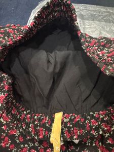 Floral Print Mini Skirt with brand tag