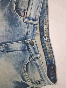 Distressed Denim Jeans