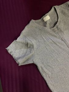grey button top