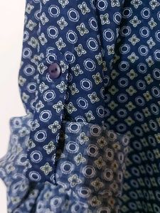 Blue Printed Georgette Top With Fold Up Sleeves.