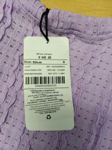 Medium Length Self Designed Eyelet Pattern Top.