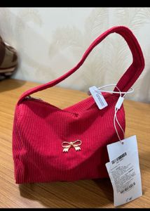 red makeup bag