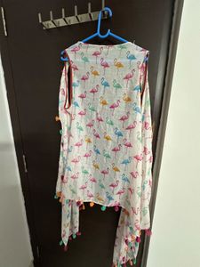 Chic Flamingo Print Scarf with Playful Pom-Poms