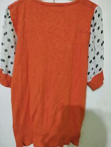 Orange Top with Polka Dot Sleeves
