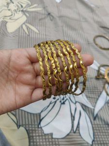 4 Design Bangles And 3 Ring 1 Pendil