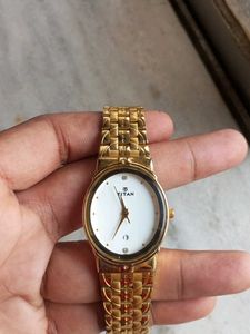 Titan Gold Tonned Oval Shaped Unisex  Watch