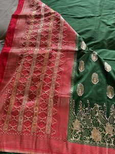 Green Banarasi Saree with Red Blouse
