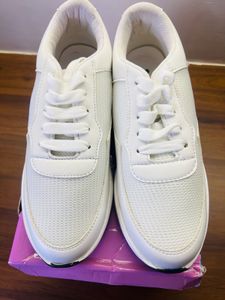 White sneakers branded new
