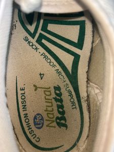 White bata shoes