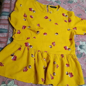 Yellow floral peplum top