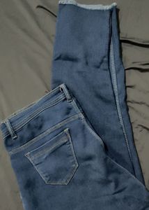 Distressed Blue Denim Jeans