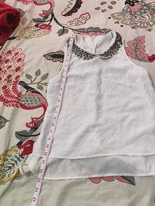 White Sleeveless Top