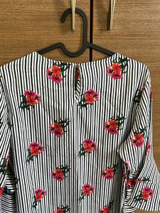 A Black Nd White Striped Formal Top