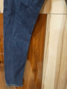 Ripped Blue Denim Jeans