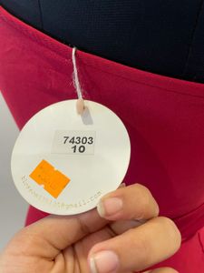 Red one shoulder slit dress