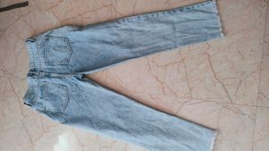 Ankle Length Torn Jeans From Zudio