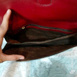 maroon vintage leather snakeprint bag