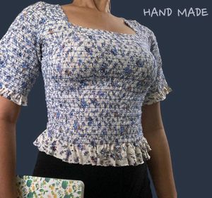 Floral Smocked Peplum Top