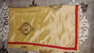 Elegant Gold Saree with Red Blouse