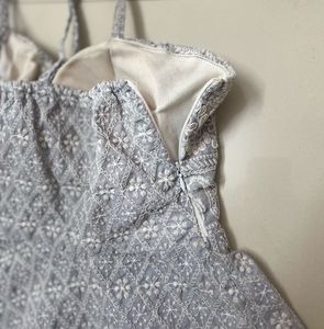 Embroidered Peplum Top