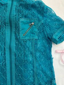 turquoise top with a zipper