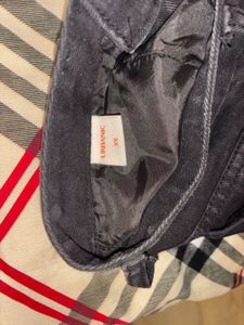 Ripped Wide-Leg Black Jeans From URBANIC