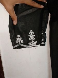 A Short Chikankari Kurti In Black Colour
