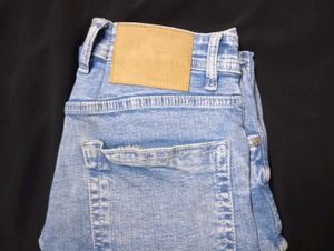 Distressed Denim Jeans