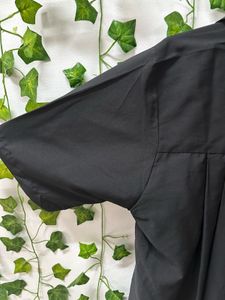 Black button up shirt