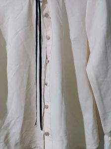 Cream Ruffle Cuff Blouse