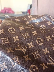 Louis Vuitton Pouch And Sling bag