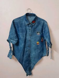Denim shirt with patches