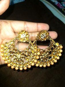 Heavy Earrings And Magtika