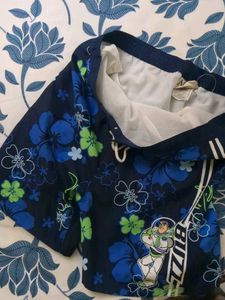 DISNEY Floral mens swimming Costume/ Beach Shorts