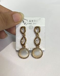 White Pearl And Golden Earrings