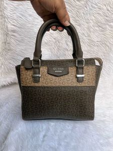 Guess Monogram Sling bag