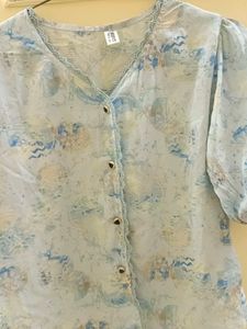 Light Blue Shirt.