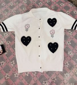 white top black hearts